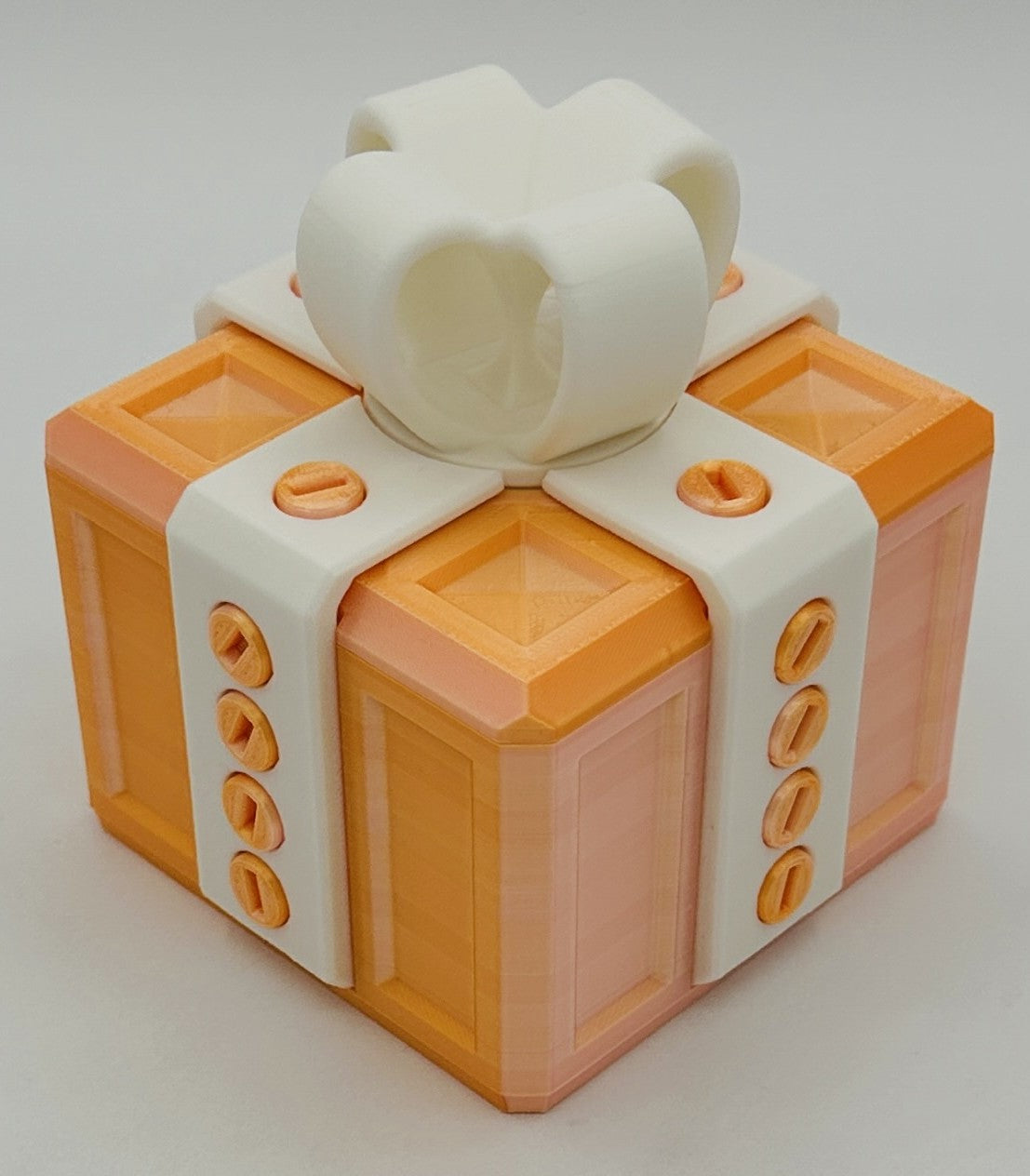 Annoying Gift Box - Multiple Color Combinations - 4x4x3" with 20 bolts + 3 Mini Figures