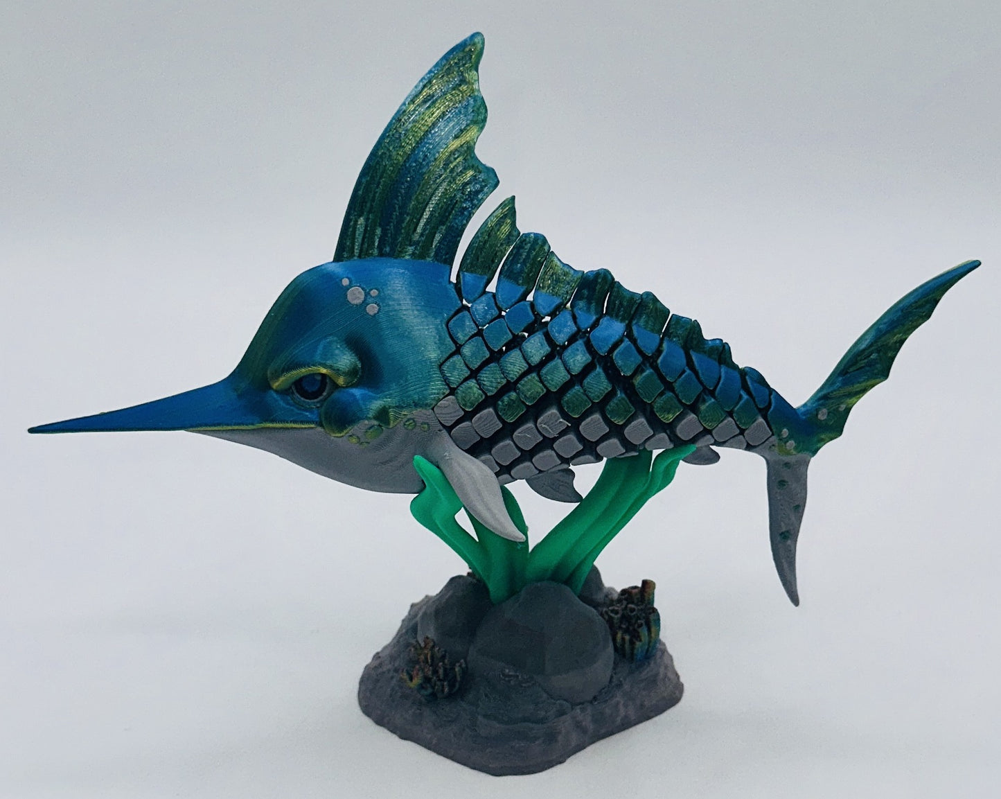 Green-Blue Swordfish Desk Pet Fidget with Coral Reef Stand