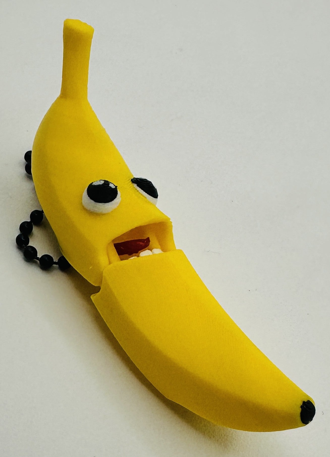 Banana Keychain - Fully articulated keychain, zipper pull, and backpack bling