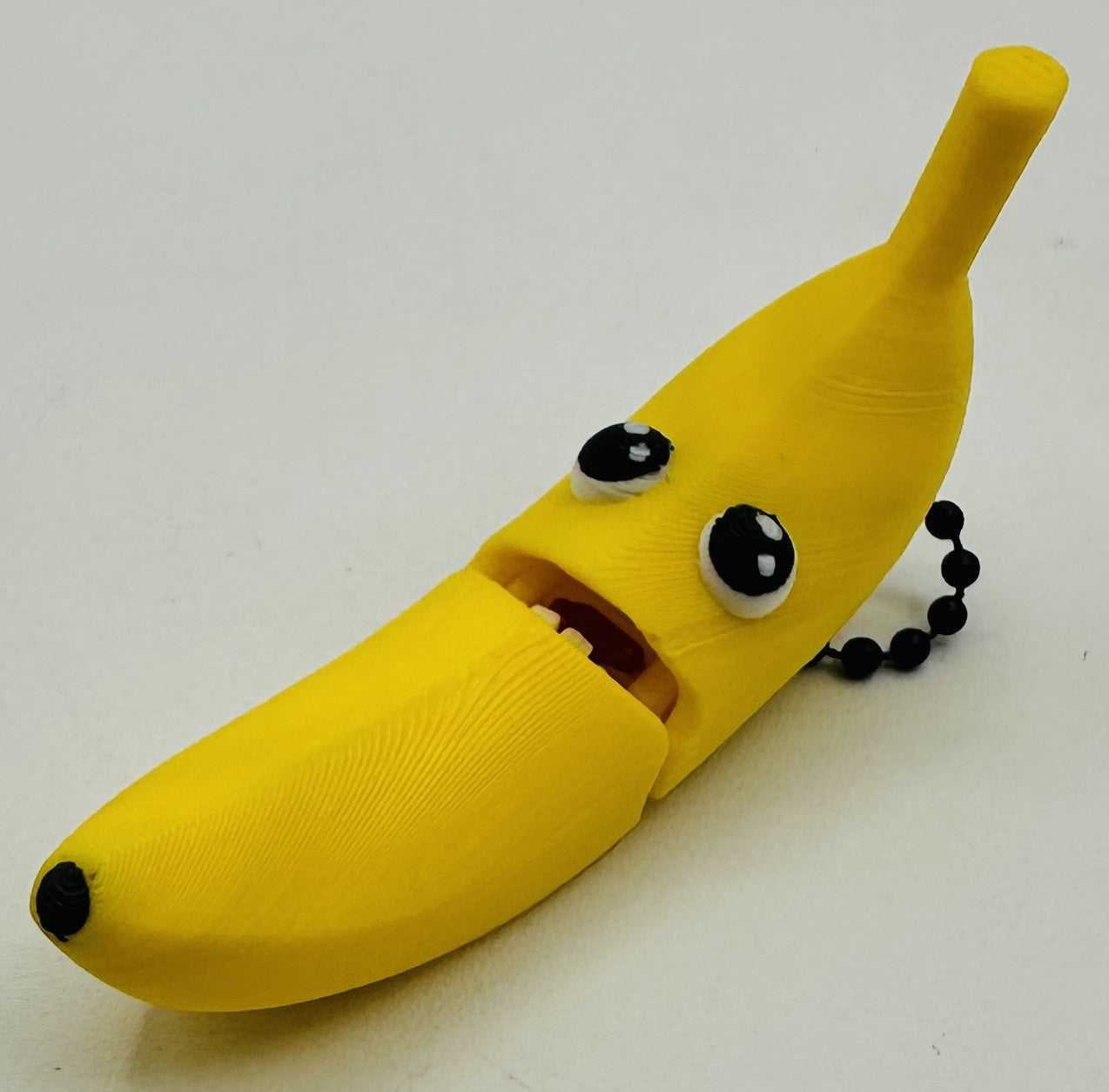 Banana Keychain - Fully articulated keychain, zipper pull, and backpack bling